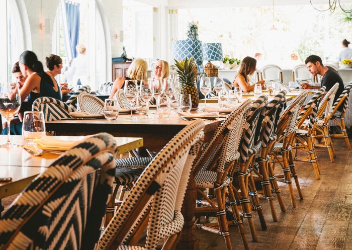 People enjoying Paper Daisy Restaurant at Halcyon House, Byron Bay