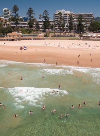 Aerial of swimmers enjoying a day at North Beach, Wollongong