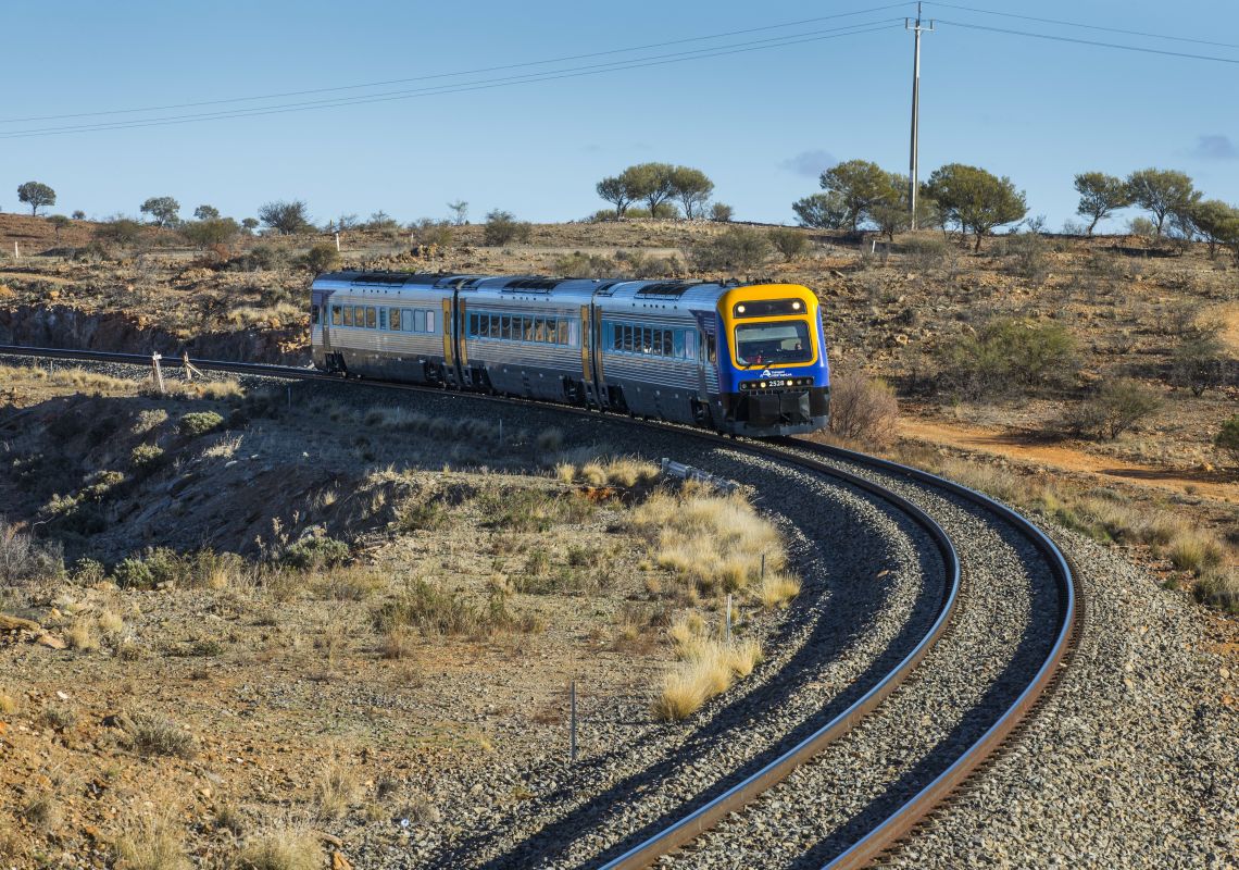 The Silver City Stiletto train bound for the Broken Heel Festival winds its way through Outback NSW.