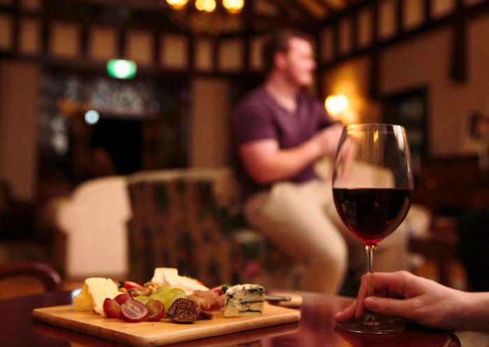 Petersons Armidale Winery and Guesthouse, Armidale Red wine and a cheese platter awaiting guests at Petersons Armidale Winery and Guesthouse, Armidale