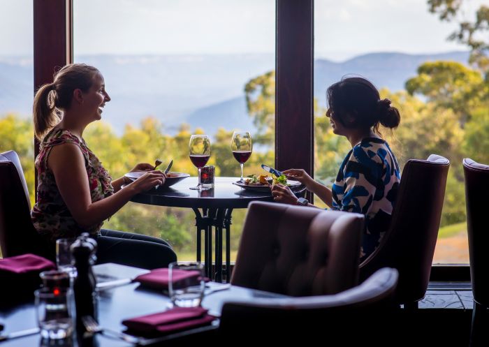 Embers Restaurant, Fairmont Resort & Spa Women enjoying food and drink at Embers Restaurant inside the Fairmont Resort & Spa, Leura in the Blue Mountains