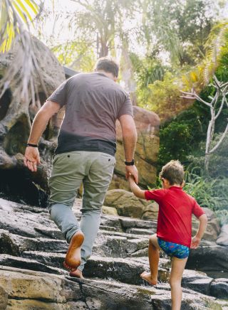 Father and son enjoying the Shipwreck Island Waterpark at BIG4 NRMA South West Rocks Holiday Park, South West Rocks
