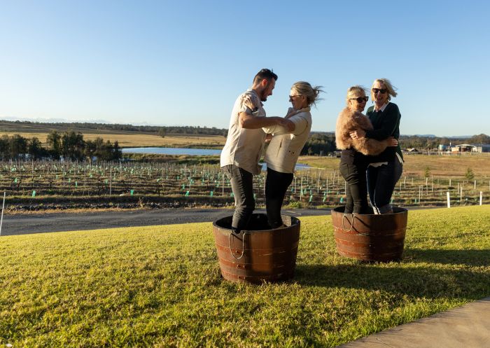 Hunter Valley Resort, Pokolbin Friends having fun crushing grapes at Hunter Valley Resort, Pokolbin