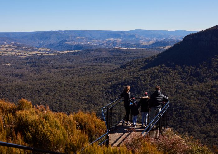 Group enjoying the scenic view with Diamond Tours at Cahill's Lookout, Katoomba