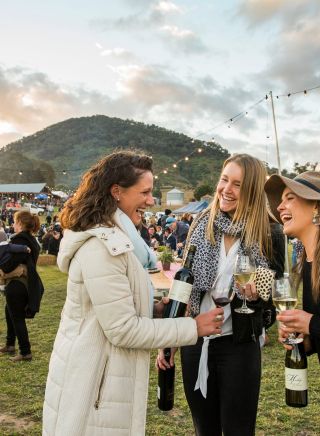 Friends enjoying drink and food at Mudgeeque in Mudgee, Country NSW
