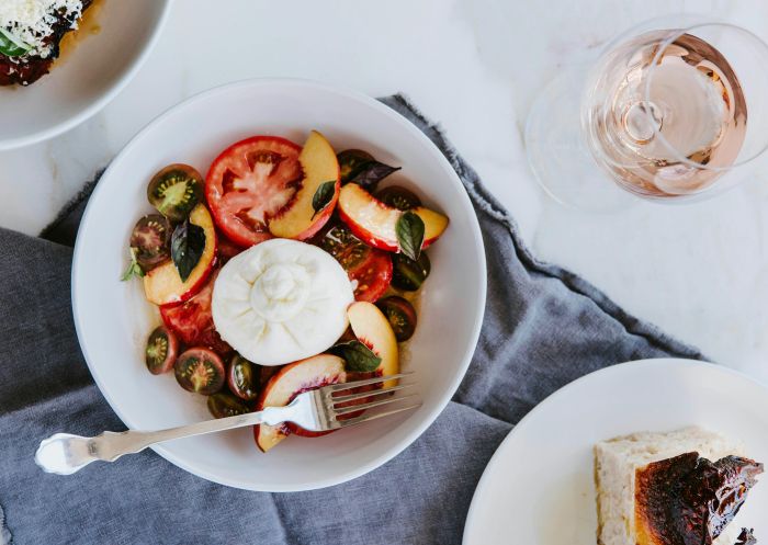 The Barn at Blue Wren Farm, Eurunderee - Credit: Amber Creative Table spread of food including burrata with local tomatoes, focaccia & eggplant parmagiana at the The Barn at Blue Wren Farm, Eurunderee