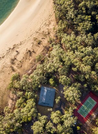 People enjoying the beach near Myer House, Mimosa Rocks National Park